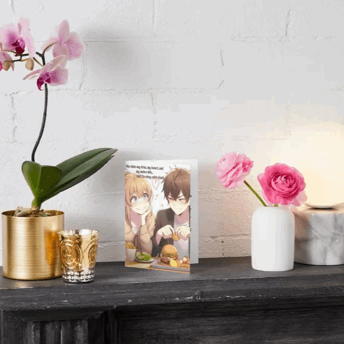 Illustration of an anime-style couple, with the male character happily eating while the female character lovingly stares in mild annoyance as her food gets stolen. The caption reads, "You stole my fries, my heart, and my entire life… and I’m okay with that.