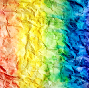 a multicolored background of crumpled paper