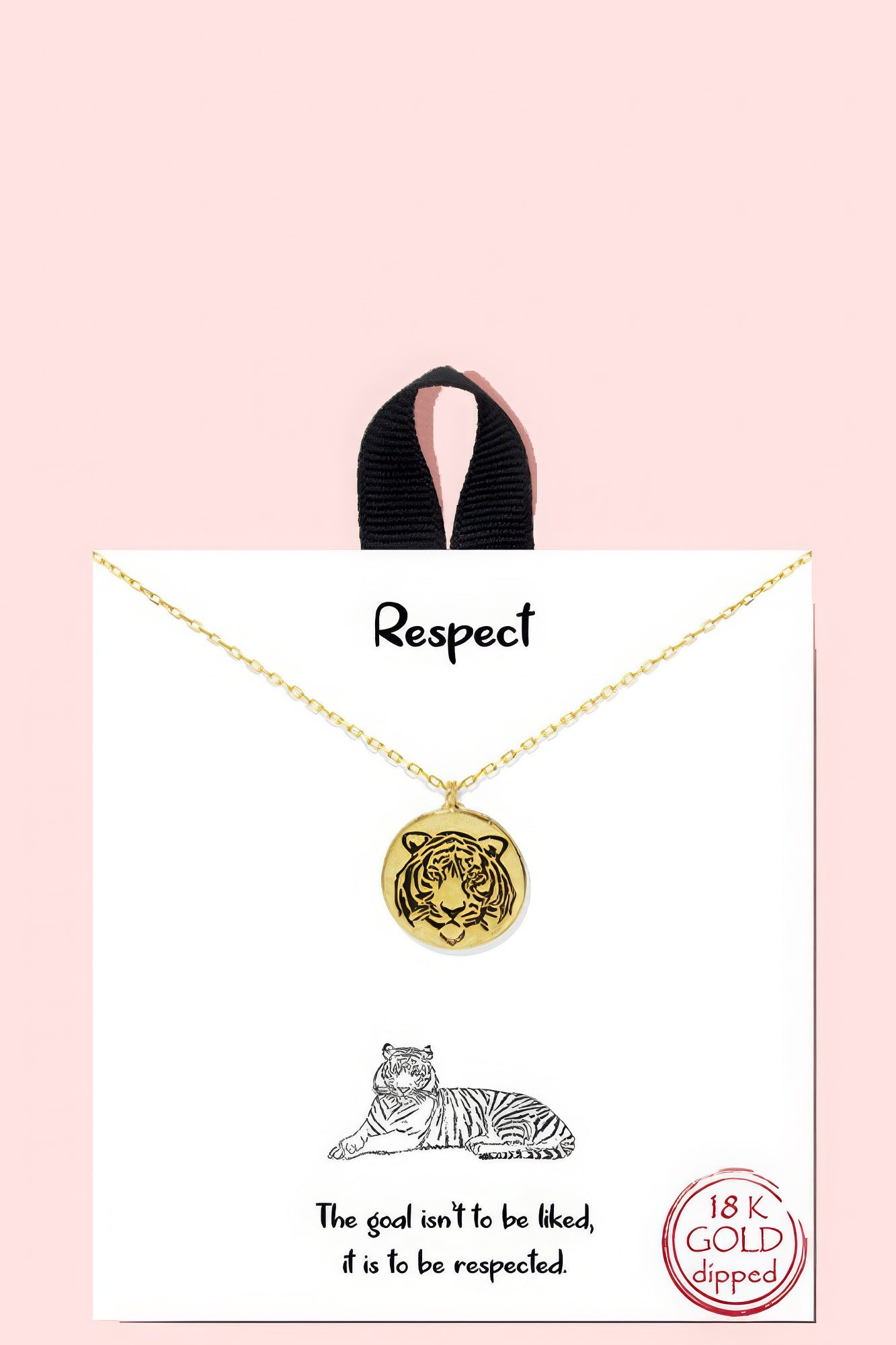 a gold necklace with a tiger on it