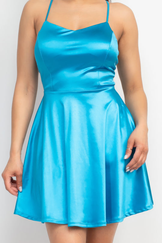 a woman in a short blue dress