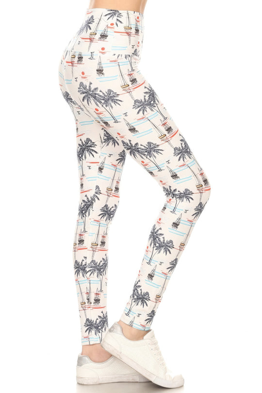 a woman wearing a pair of palm trees printed leggings