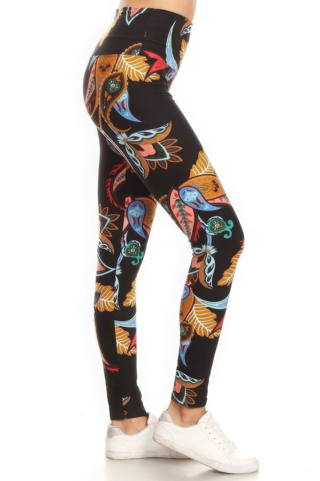 a person in black leggings with colorful flowers on them