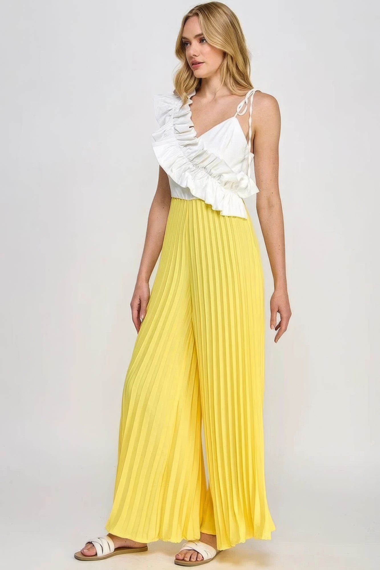 Asymmetrical Ruffle Jumpsuit: Pleated Bottom, Cami Style - Vibrant Yellow/Off White