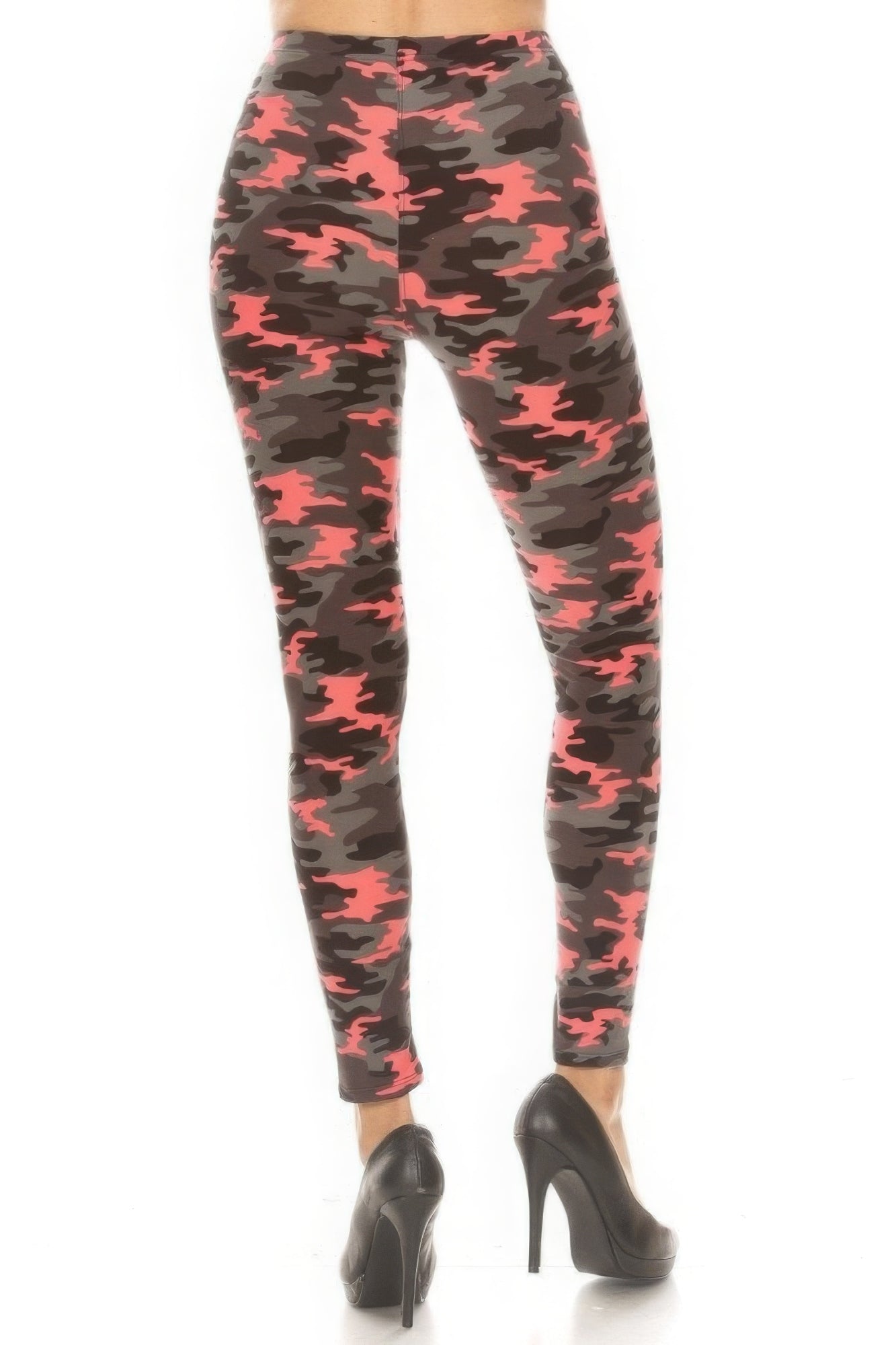 a woman person a pair of camouflage print leggings