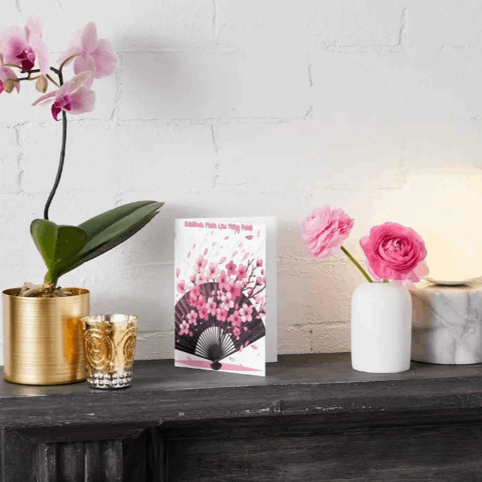 Illustration of an anime thank you card featuring cherry blossom petals drifting onto an elegant open fan, symbolizing gratitude and appreciation with soft, ethereal beauty.